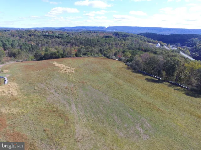 a view of an outdoor space with mountain view