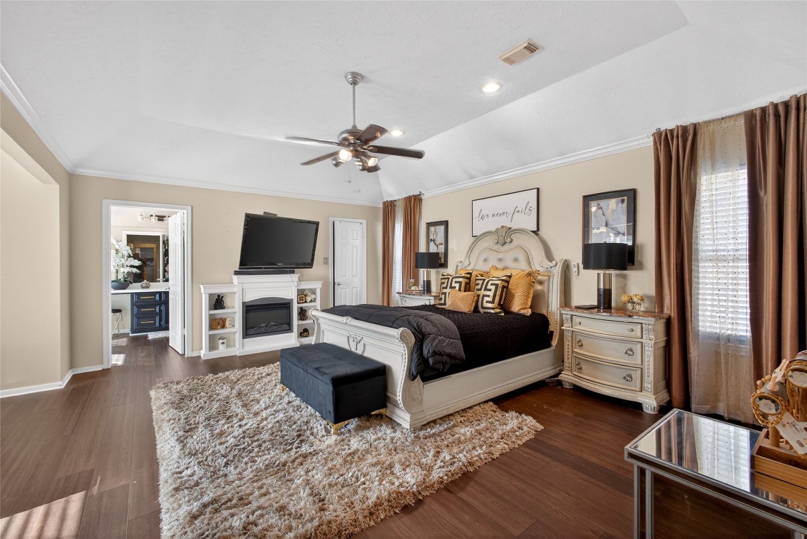 19115 Keyturn Lane Humble, TX 77346 - Photo 17 of 32 a living room with furniture fireplace and flat screen tv