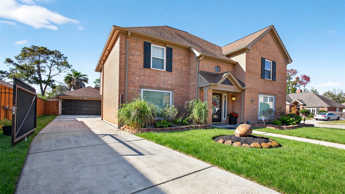 19115 Keyturn Lane Humble, TX 77346 - Photo 6 of 32 a front view of a house with a yard