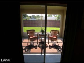 1010 Northeast Morgan Palm Bay, FL 32905 - Photo 10 of 12 a dining room with furniture and a floor to ceiling window