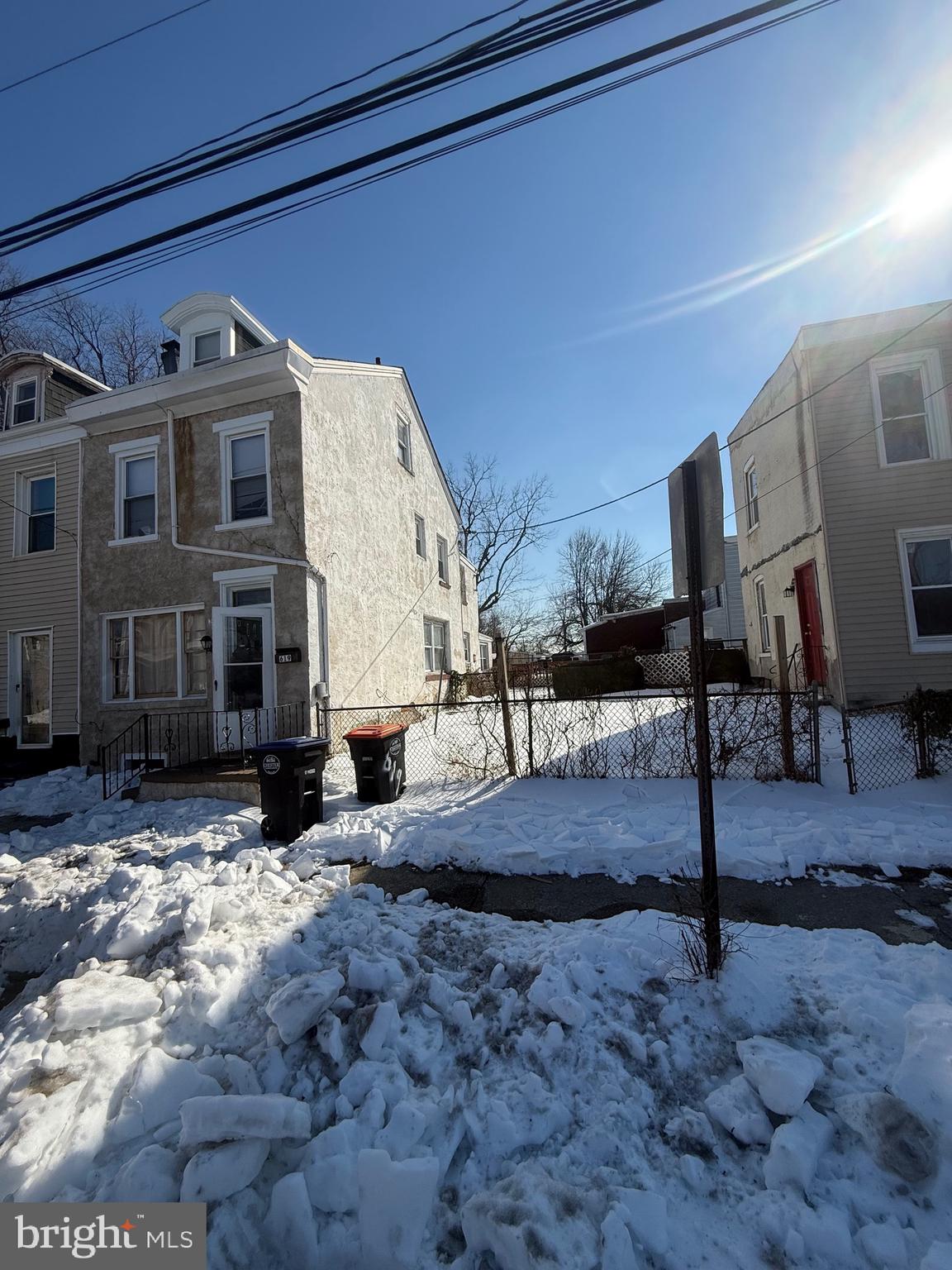 619 West 5th Street Chester, PA 19013 - Photo 2 of 17 a view of a house with a snow in the yard