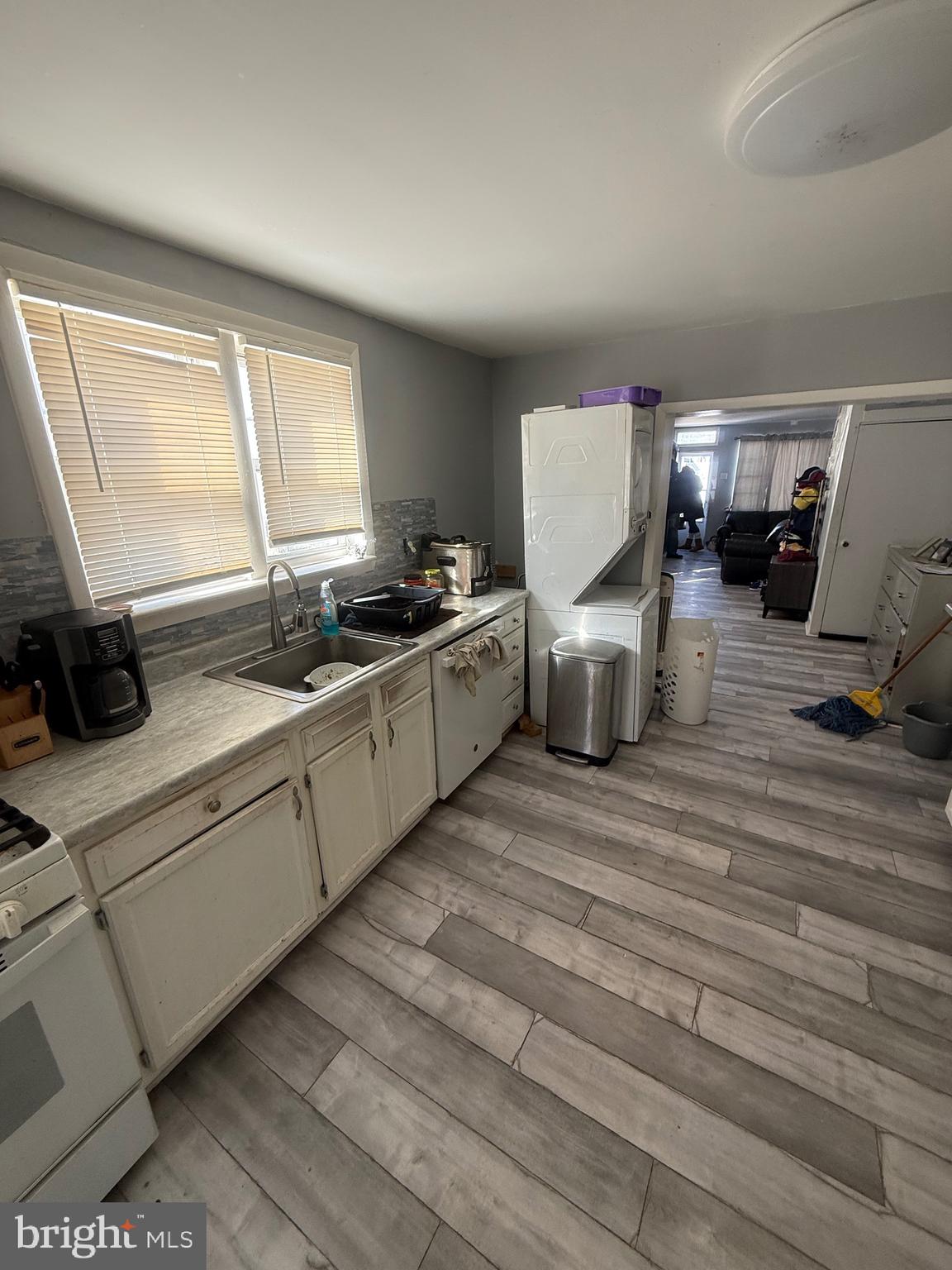 619 West 5th Street Chester, PA 19013 - Photo 7 of 17 a kitchen with a stove and a refrigerator