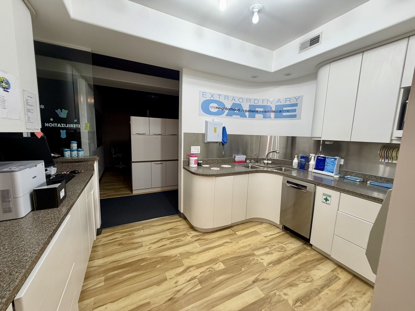 134 West State Street Sycamore, IL 60178 - Photo 20 of 20 a kitchen with a refrigerator sink and white cabinets