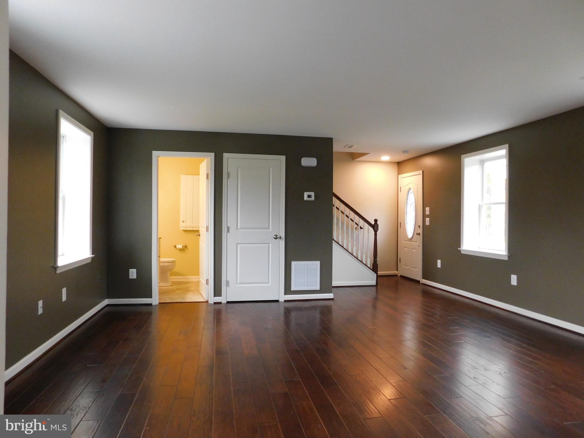 1989 Castleton Road Darlington, MD 21034 - Photo 7 of 24 Living Room view to front door and 1/2 bath