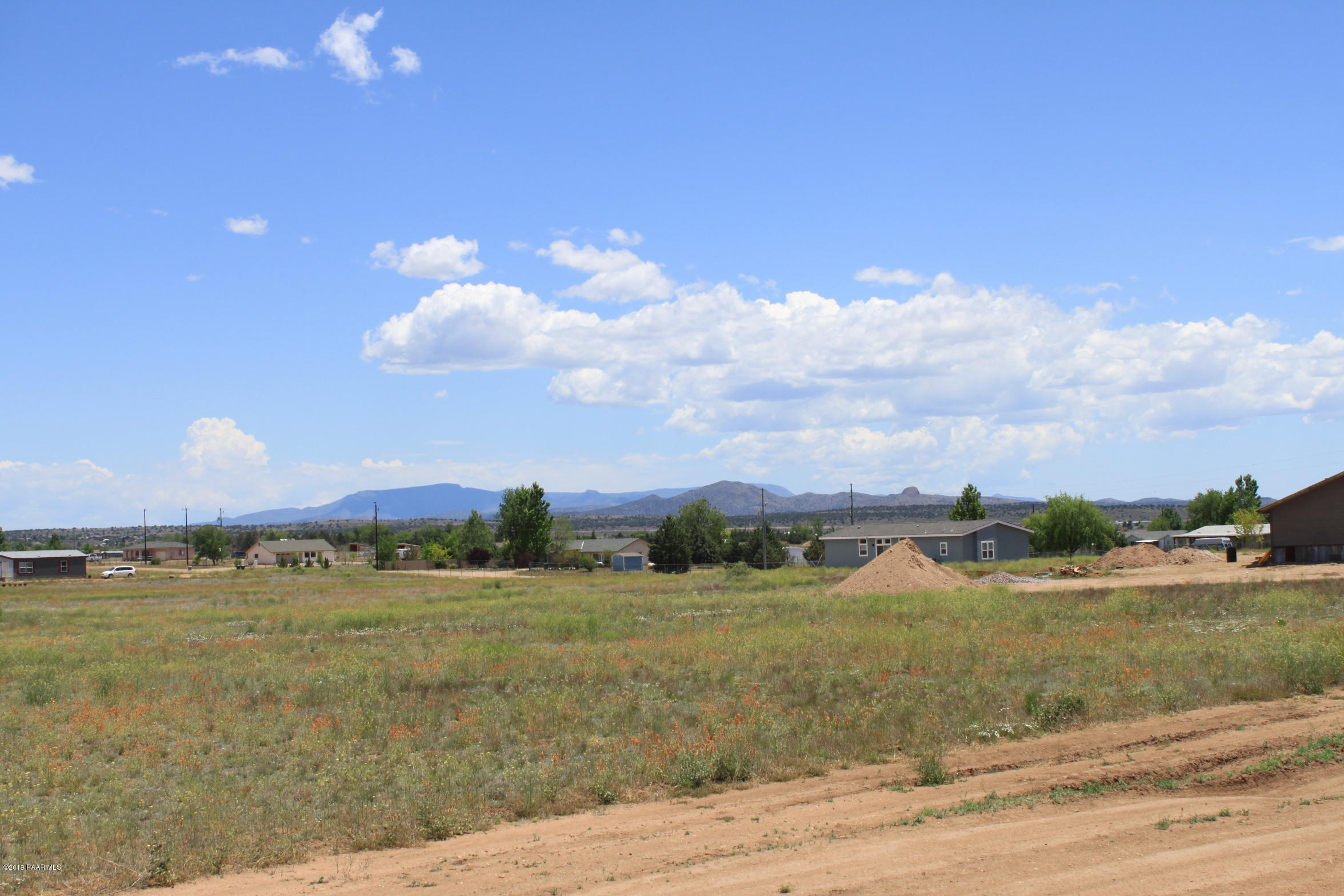 25580 North High Desert Road Paulden, AZ 86334 - Photo 18 of 18 a view of a lake with houses in the background