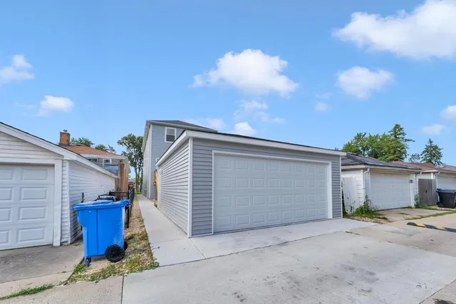 a view of a house with a garage