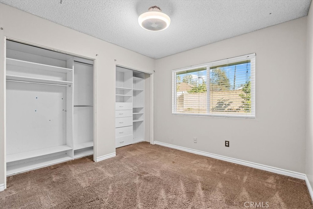 6240 Wiehe Avenue Riverside, CA 92506 - Photo 24 of 47 an empty room with windows and closet