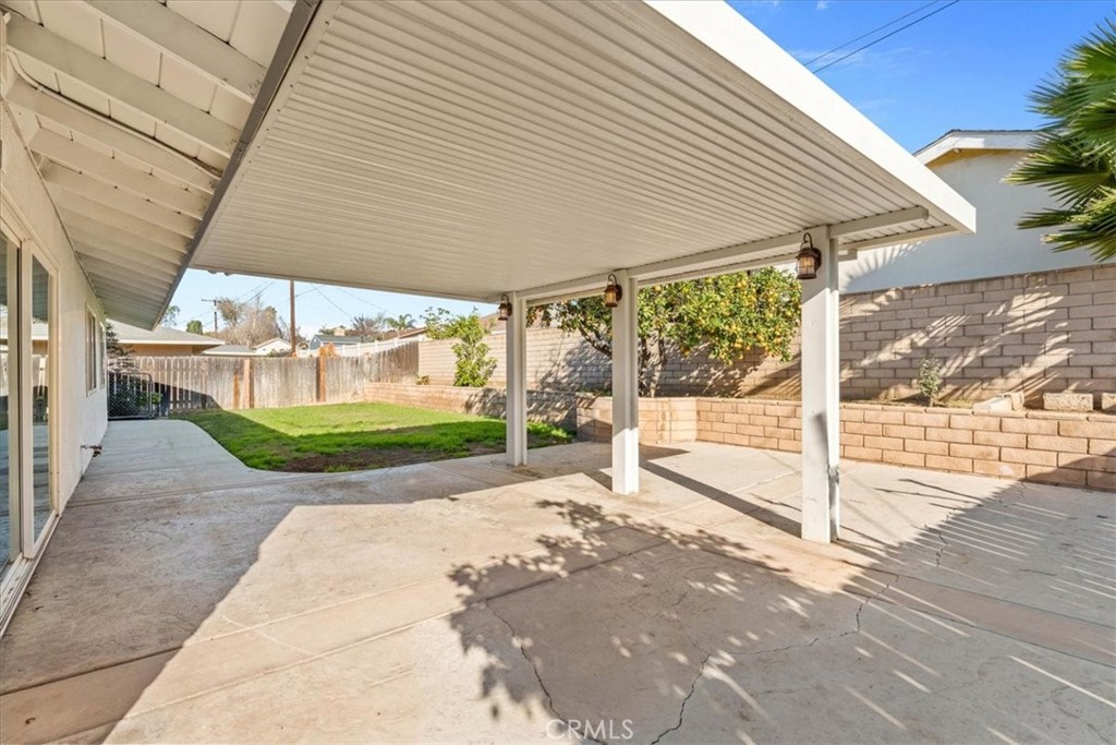6240 Wiehe Avenue Riverside, CA 92506 - Photo 26 of 47 a view of a house with a backyard and a patio