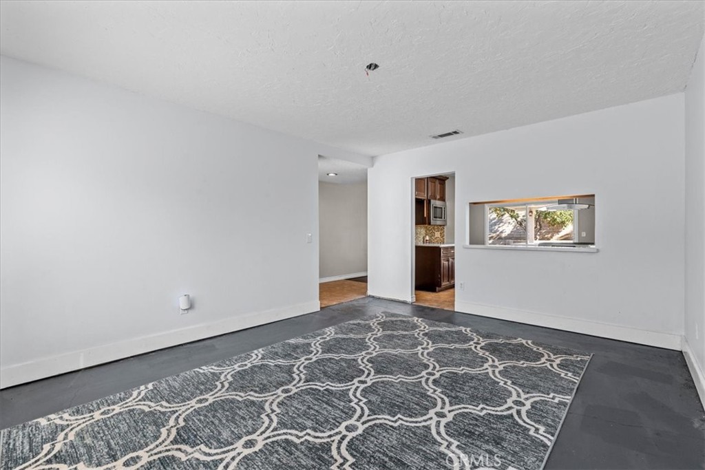 6240 Wiehe Avenue Riverside, CA 92506 - Photo 7 of 47 a view of an empty room with a window