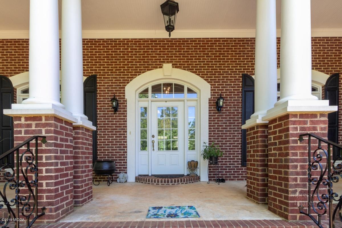 800 Pine Grove Church Road Culloden, GA 31016 - Photo 2 of 30 a front view of a building