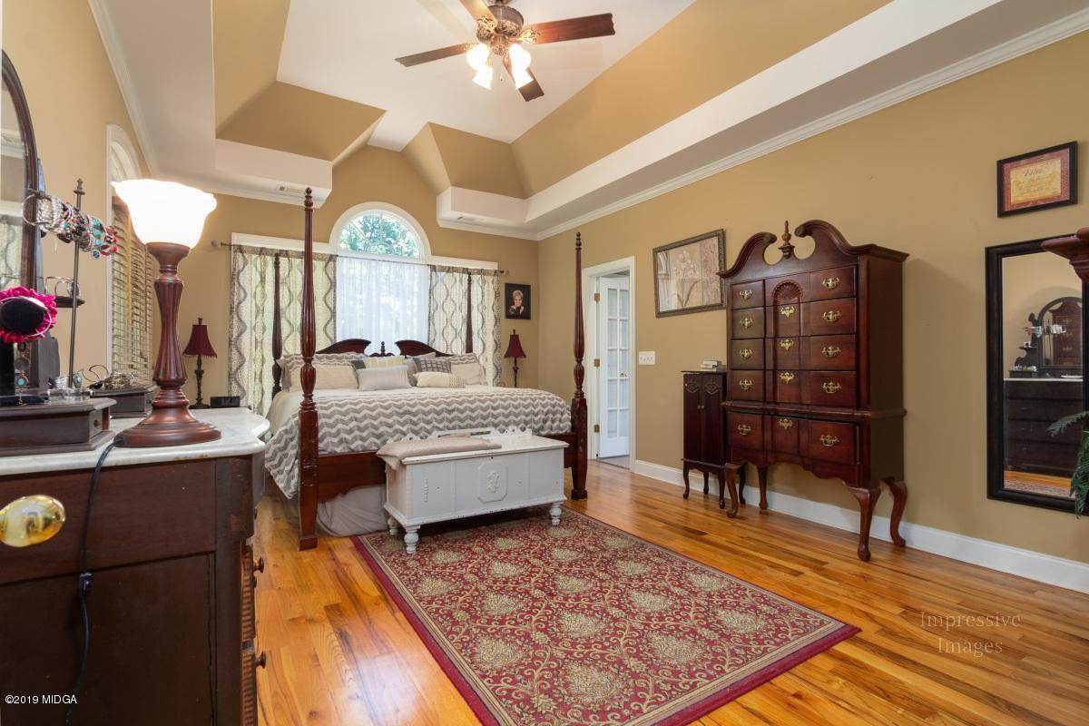 800 Pine Grove Church Road Culloden, GA 31016 - Photo 13 of 30 a living room with furniture and a rug