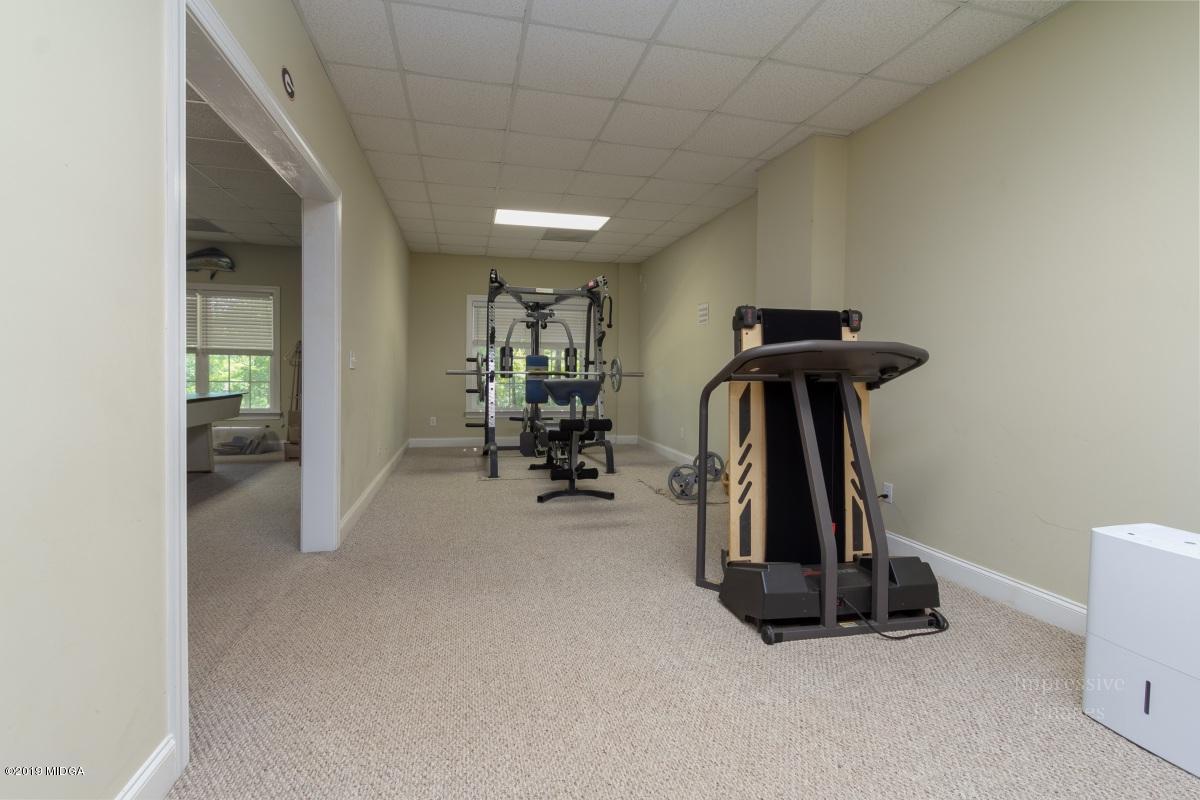 800 Pine Grove Church Road Culloden, GA 31016 - Photo 21 of 30 a view of a room with gym equipment