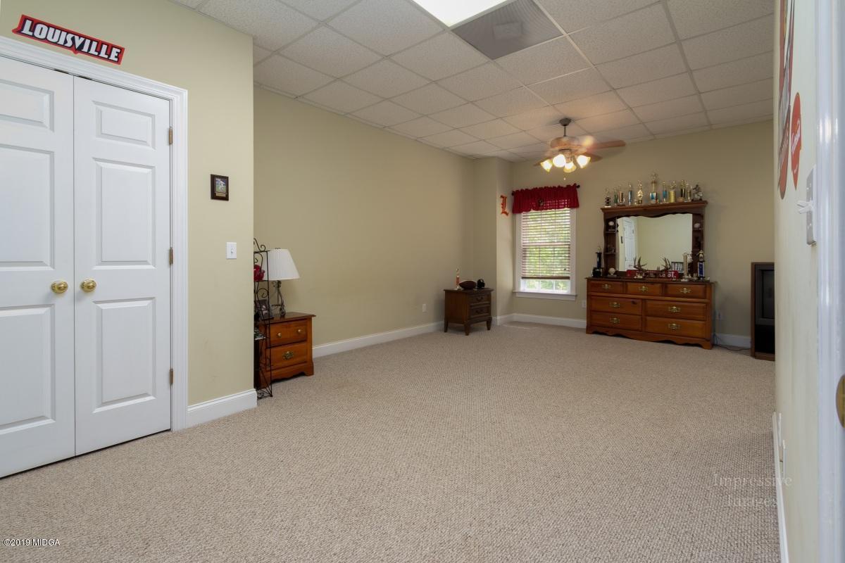 800 Pine Grove Church Road Culloden, GA 31016 - Photo 25 of 30 a view of a livingroom with a furniture