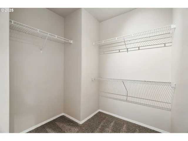 a view of a room with racks on the wall