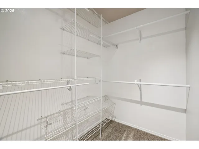 a view of an empty walk in closet