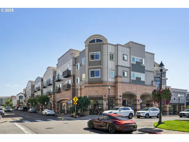 a front view of a building with parking space
