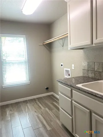 a room with storage and utility