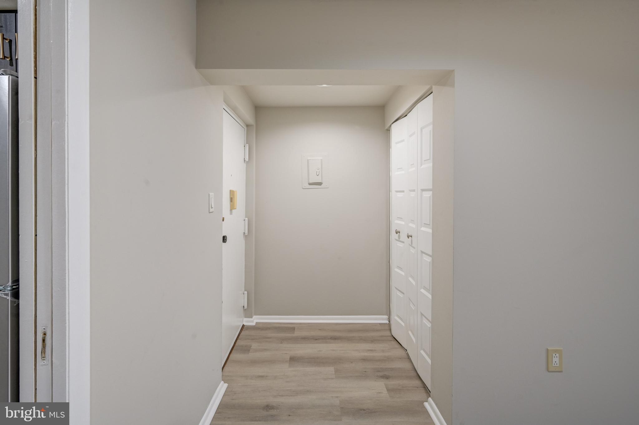 5241 West Running Brook Road, Unit 302 Columbia, MD 21044 - Photo 26 of 32 a view of hallway with closet area