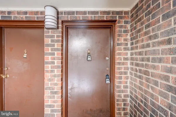 a bathroom with a shower and a sink