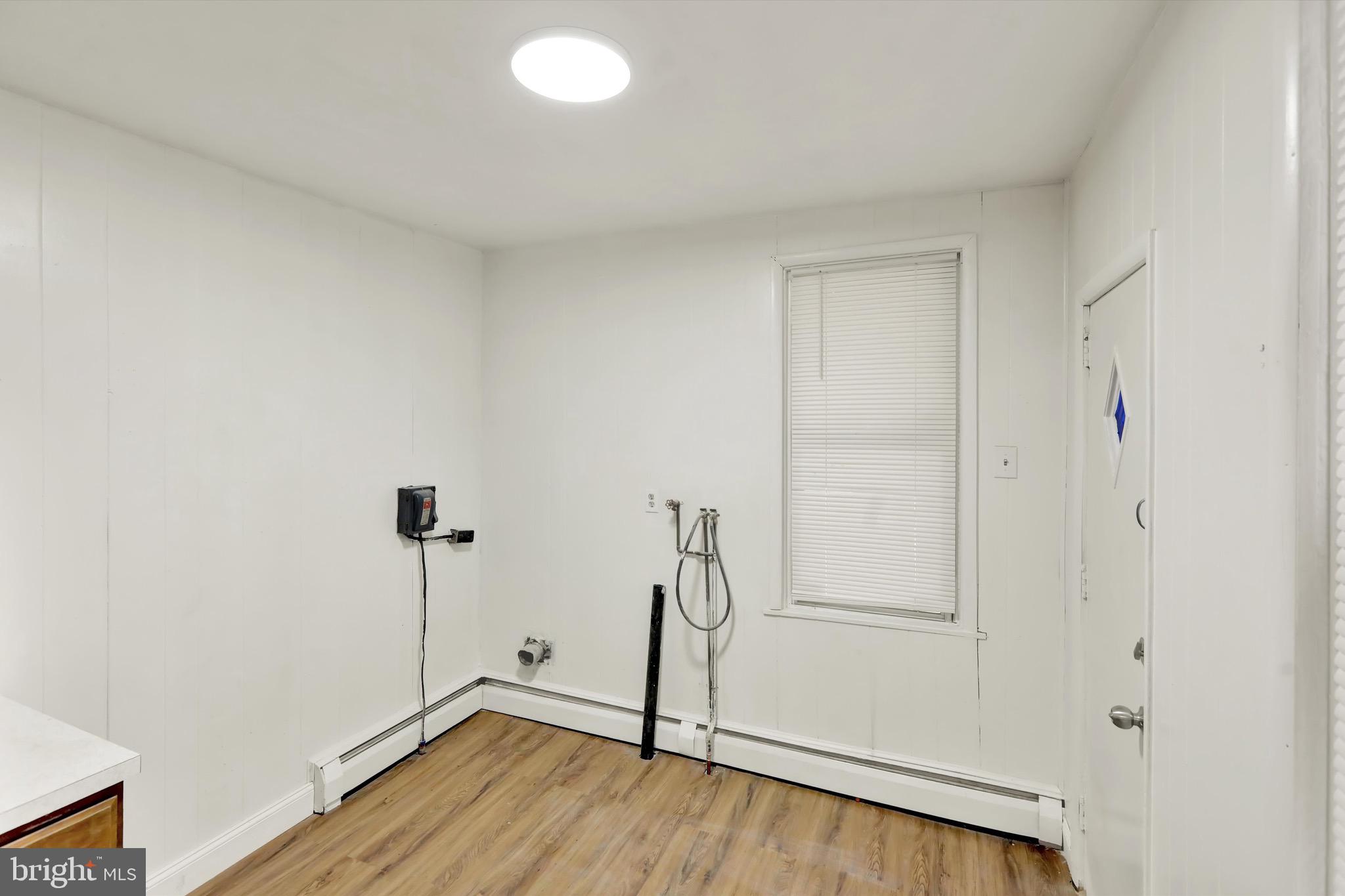 236 Wunder Street Reading, PA 19602 - Photo 11 of 27 a view of empty room with wooden floor