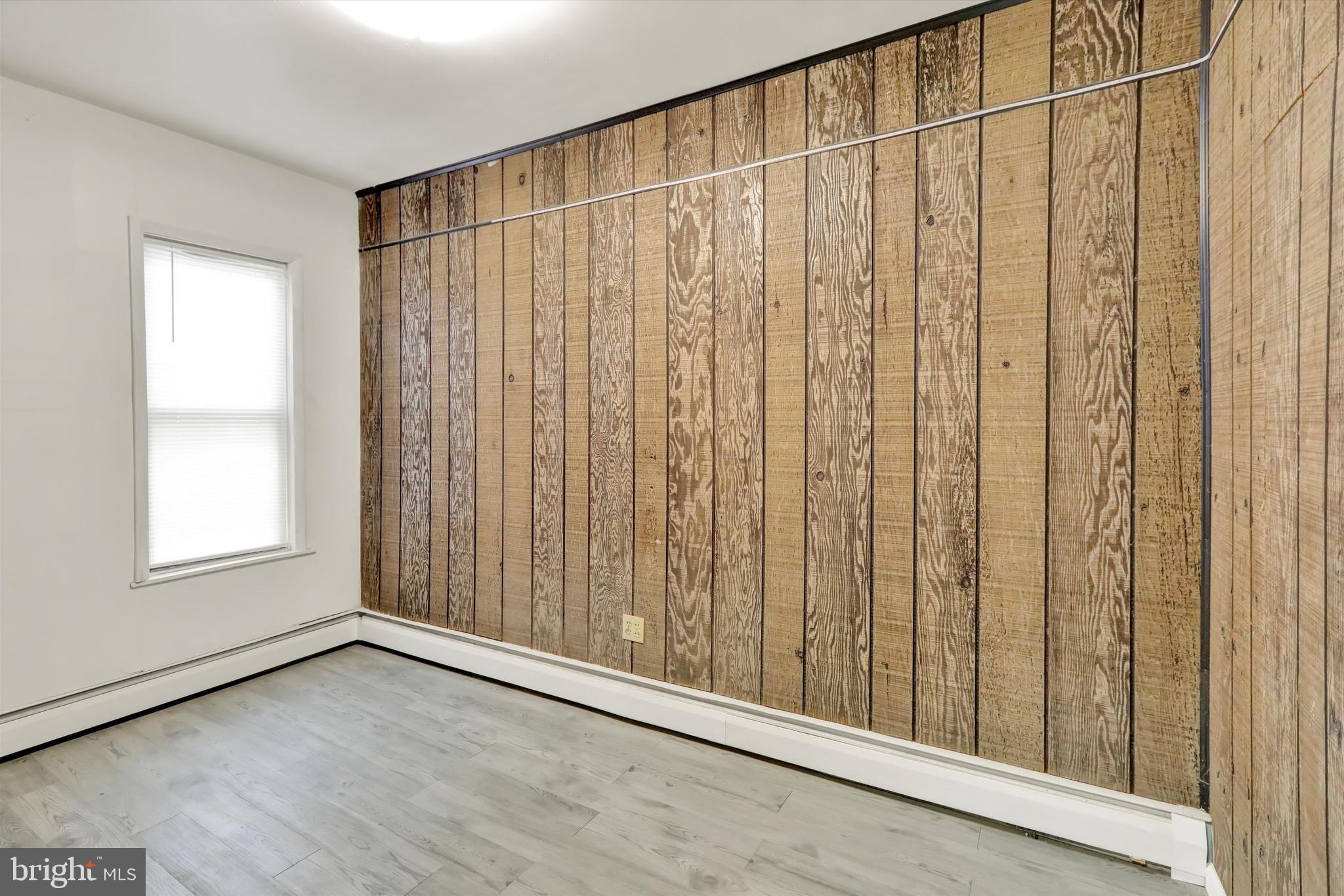 236 Wunder Street Reading, PA 19602 - Photo 13 of 27 a view of a black gate with wooden floor