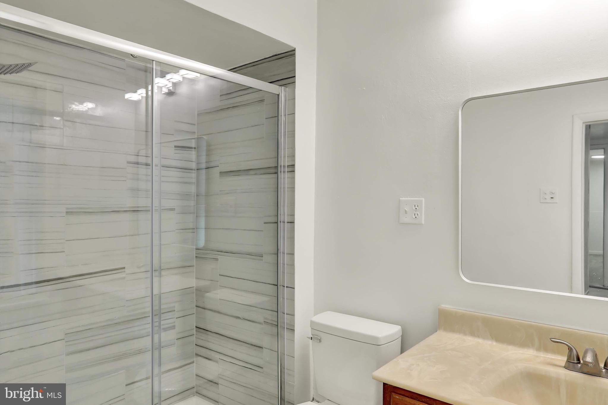 236 Wunder Street Reading, PA 19602 - Photo 18 of 27 a bathroom with a shower and a toilet