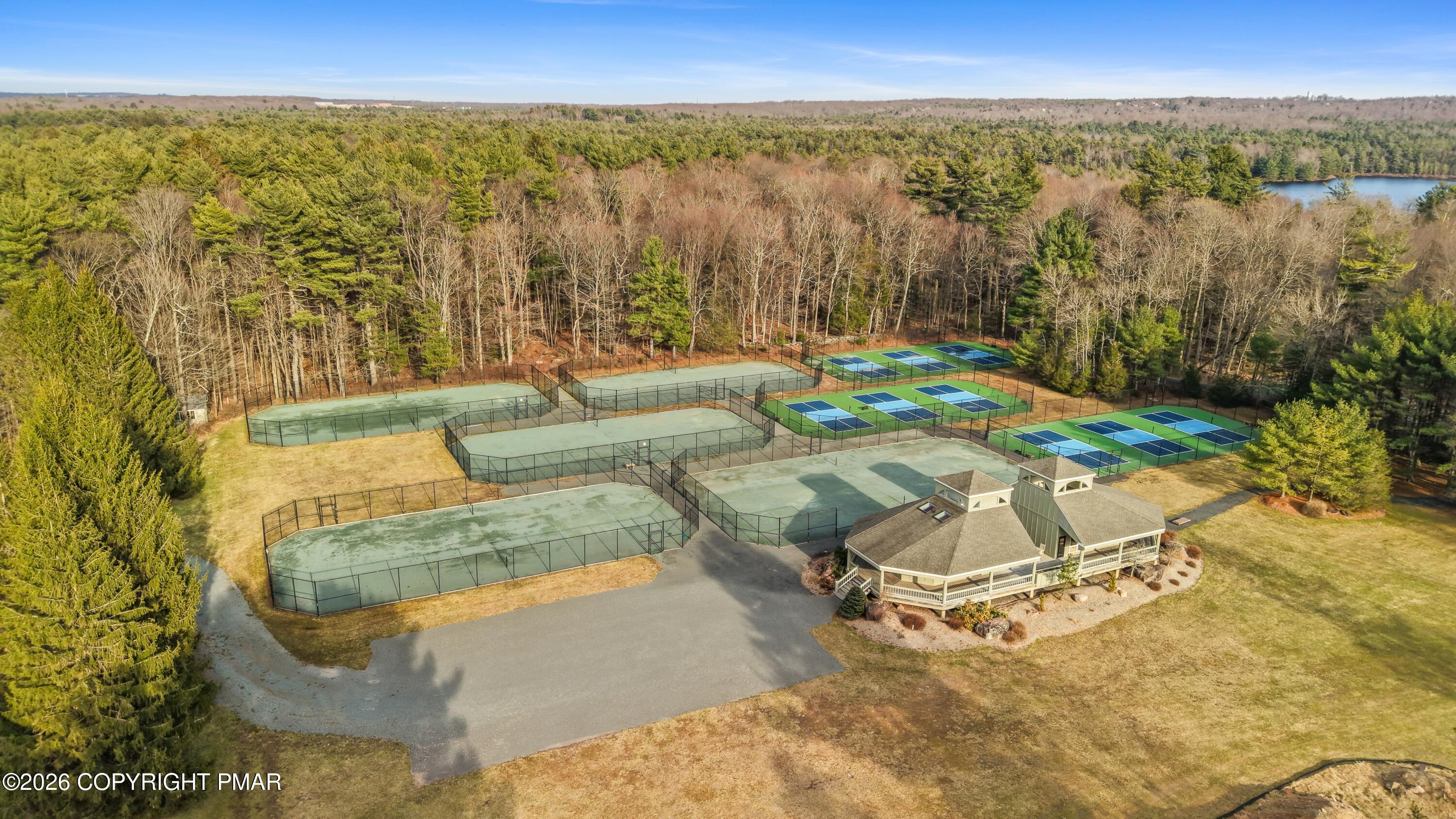 Onondaga Road Pocono Pines, PA 18350 - Photo 13 of 21 a view of a swimming pool with a yard and mountain view