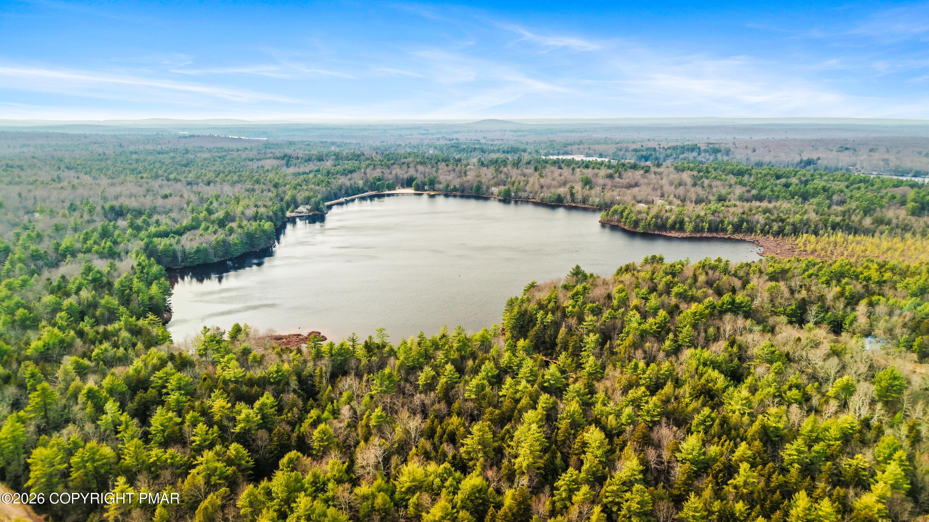 Onondaga Road Pocono Pines, PA 18350 - Photo 8 of 21 a view of a lake with a city