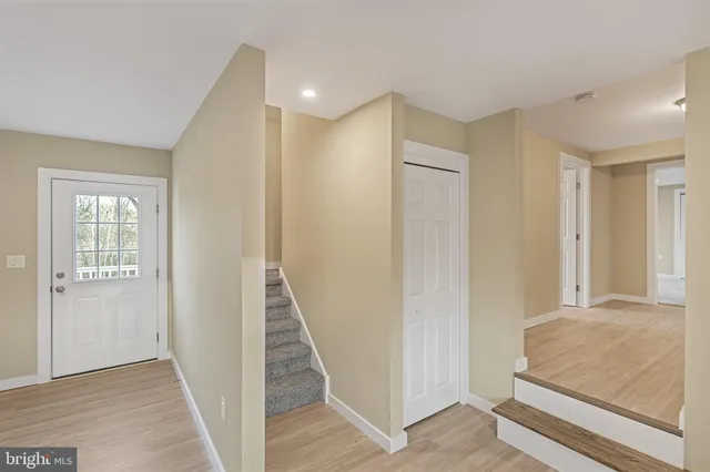 a view of a hallway with front door