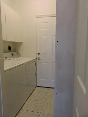 a utility room with a washer and dryer