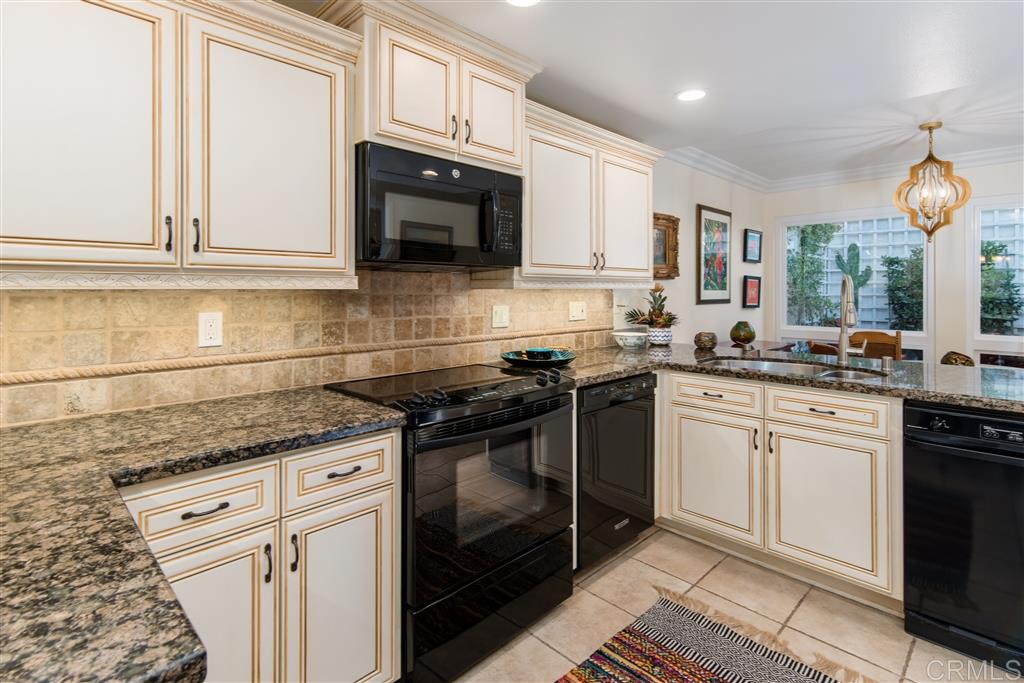 3016 Via De Caballo Encinitas, CA 92024 - Photo 3 of 14 Granite counter tops, new lighting