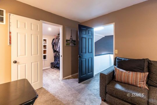 420 Montefino Drive Ridgecrest, CA 93555 - Photo 19 of 38 a living room with furniture and a rug