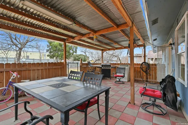 a view of a tables and chairs in patio