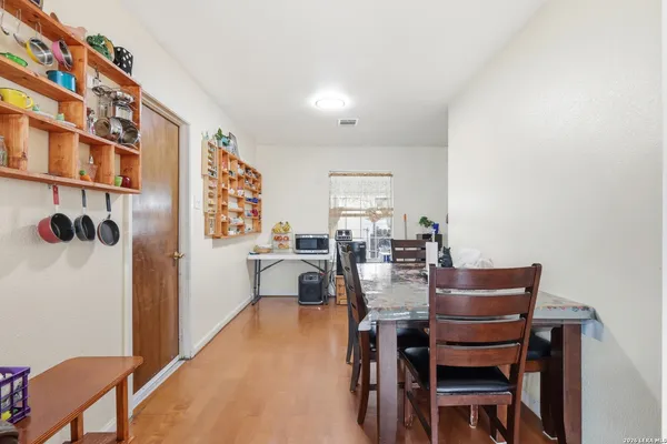 a view of a dining room with furniture