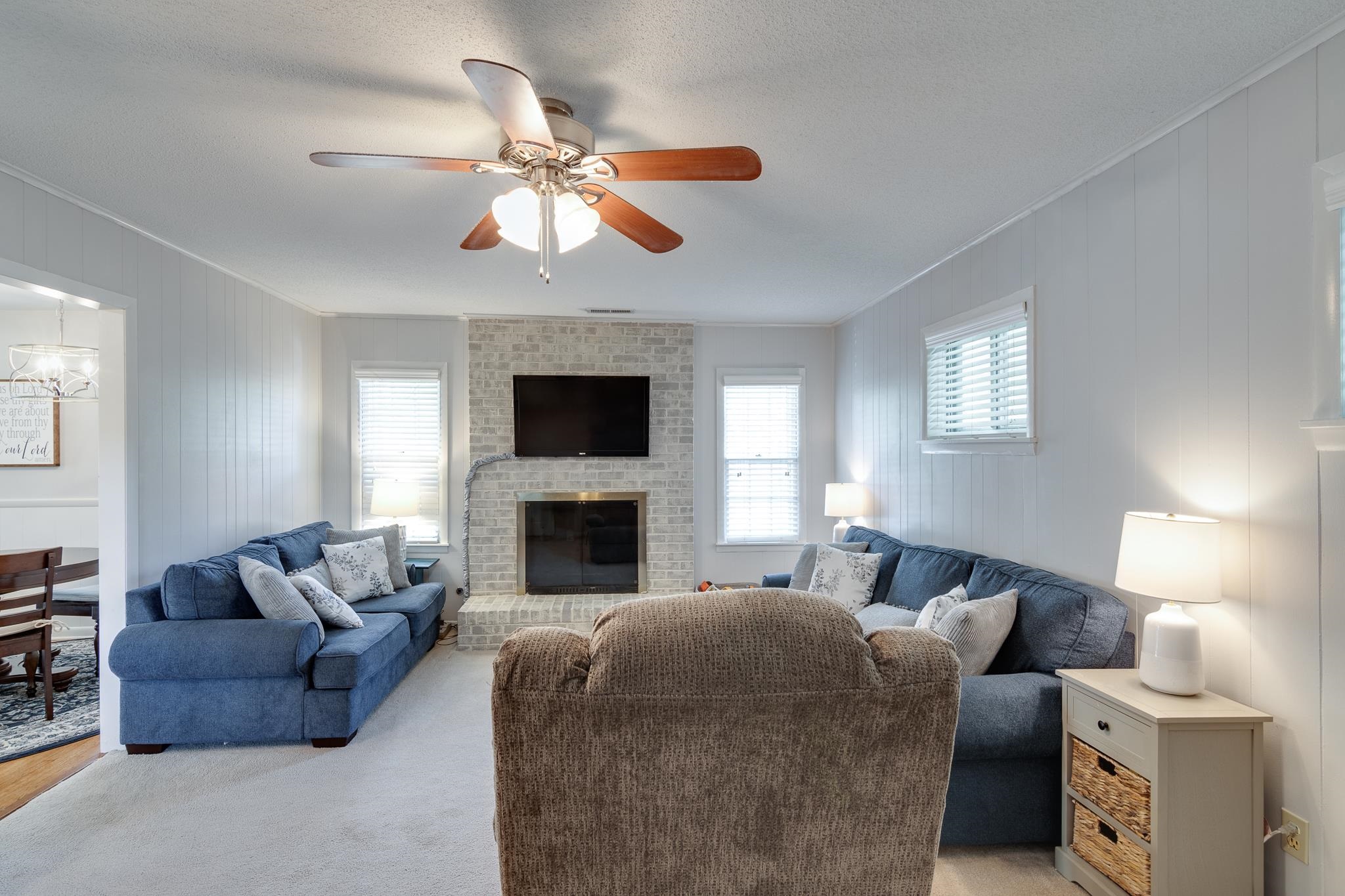 274 Montelo Road Memphis, TN 38120 - Photo 12 of 25 a living room with furniture and a fireplace
