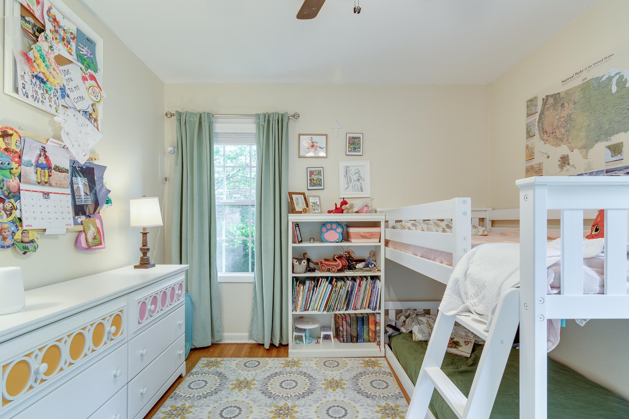 274 Montelo Road Memphis, TN 38120 - Photo 21 of 25 a bedroom with furniture and a book shelf