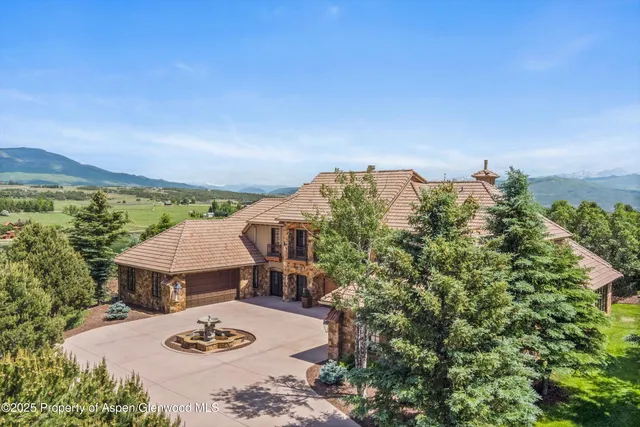 a view of a patio with furniture