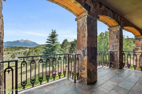 a view of a balcony with an outdoor space