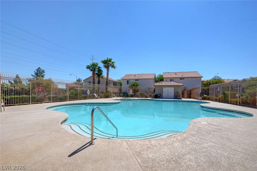 7259 Cestrum Road Las Vegas, NV 89113 - Photo 32 of 35 A sparkling community pool offers refreshing recreation on sun-drenched days.