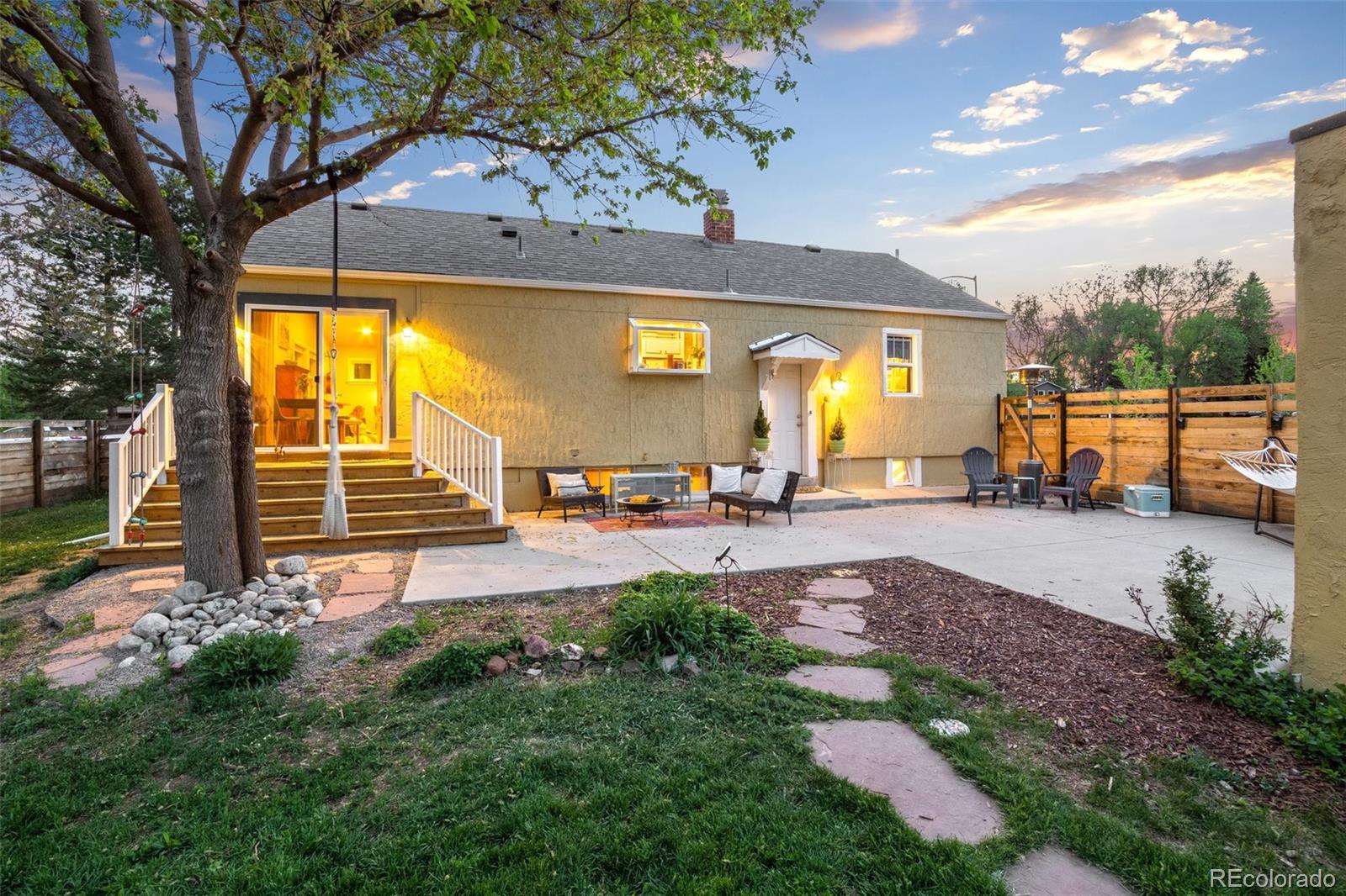 3010 Pierce Street Wheat Ridge, CO 80214 - Photo 23 of 34 a view of a swimming pool with a bench in front of it