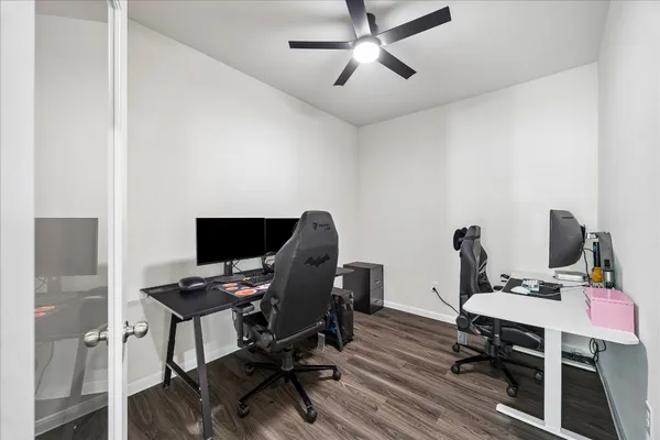 a view of a workspace with furniture