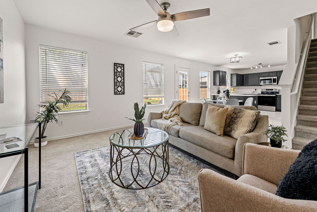 525 Meadow Park Drive Georgetown, TX 78626 - Photo 11 of 39 a living room with furniture kitchen view and a window