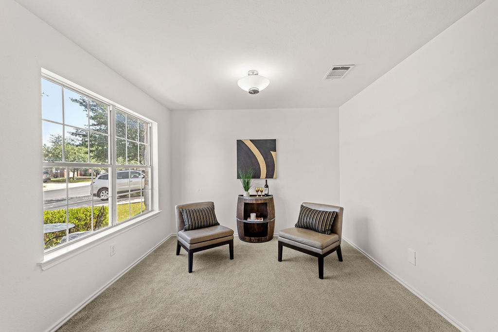 525 Meadow Park Drive Georgetown, TX 78626 - Photo 13 of 39 a living room with furniture and a window