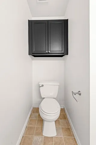 a bathroom with a toilet