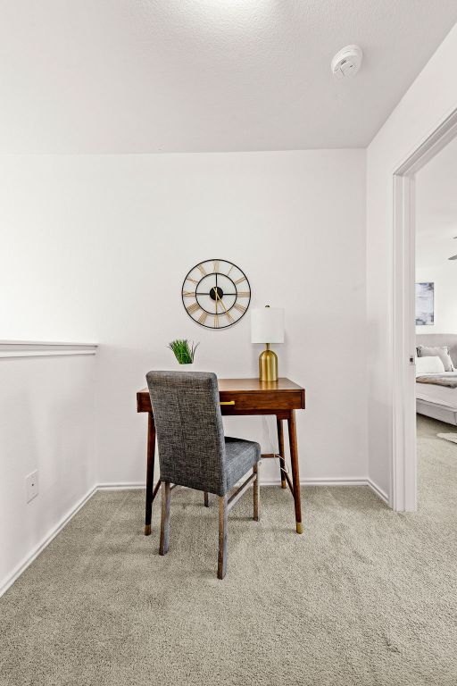 525 Meadow Park Drive Georgetown, TX 78626 - Photo 28 of 39 a view of a room with a table and chairs