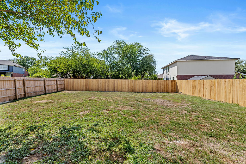 525 Meadow Park Drive Georgetown, TX 78626 - Photo 37 of 39 a view of a backyard