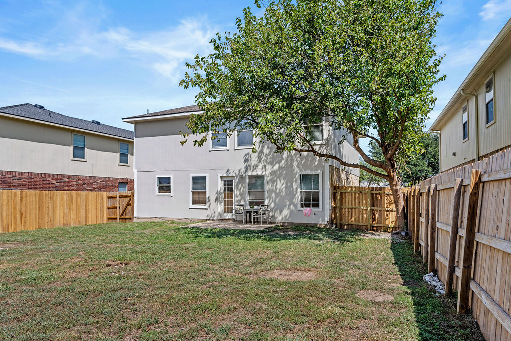 525 Meadow Park Drive Georgetown, TX 78626 - Photo 39 of 39 a front view of house with yard and trees in the background