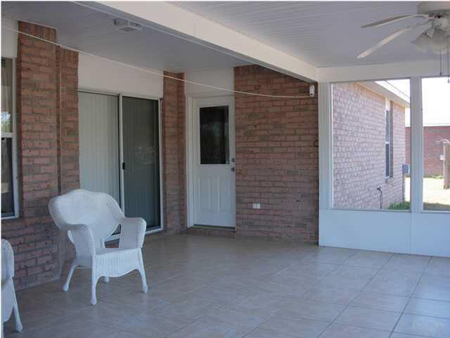 Large tiled screened porch