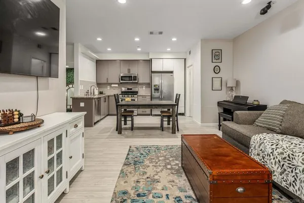 a living room with furniture and a table