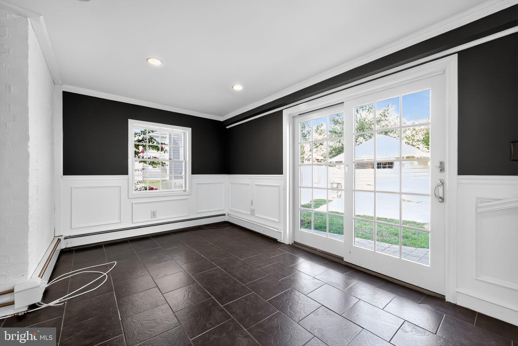 159 Wayne Avenue Haddonfield, NJ 08033 - Photo 15 of 30 a view of an empty room with wooden floor and a window